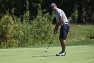 Aaron Rodgers on the course